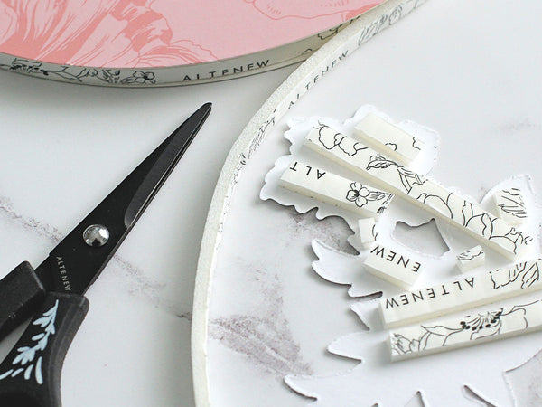 Trim the exact length of foam tape you need for your die-cut or card panel.