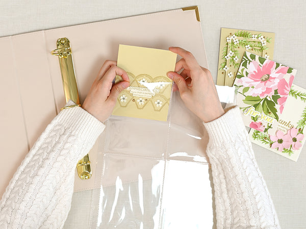 Attach the double-sided pocket pages, open side up.