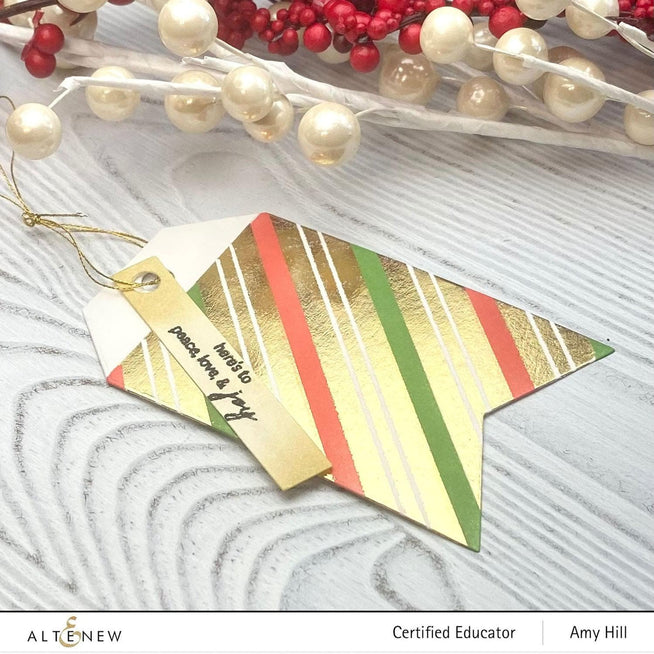 Altenew Tiny Festive Patterns Hot Foil Plate Set with four intricate holiday-themed foil plates for crafting and decorating.