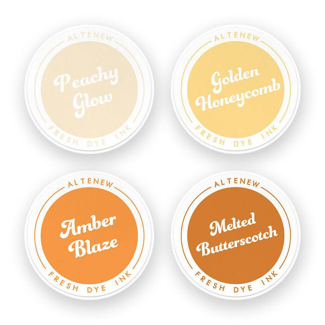 Altenew Sun-Kissed Delights Fresh Dye Ink bundle with vibrant ink pads in sunny yellow, orange, and coral shades.
