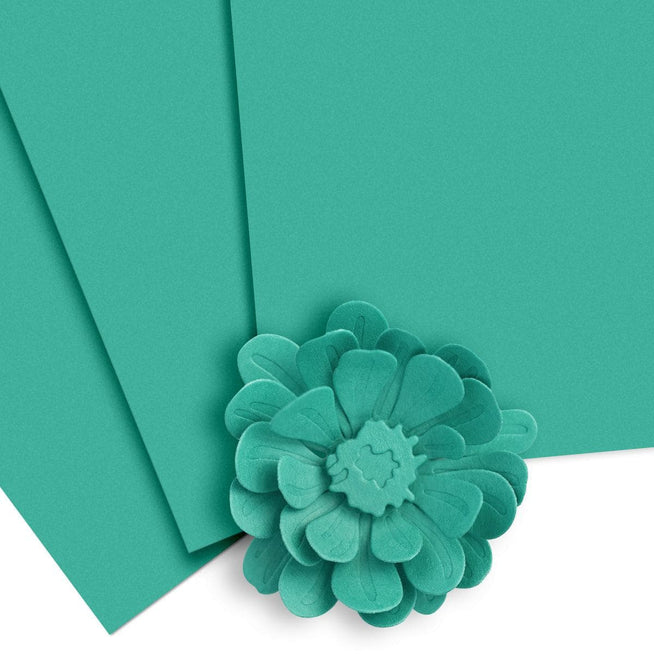 Altenew Crafty Necessities Cardstock Bundle with assorted colorful paper sheets for crafting and card making projects.