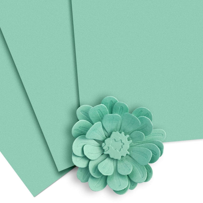 Altenew Crafty Necessities Cardstock Bundle with assorted colorful sheets arranged in a neat stack for crafting projects.