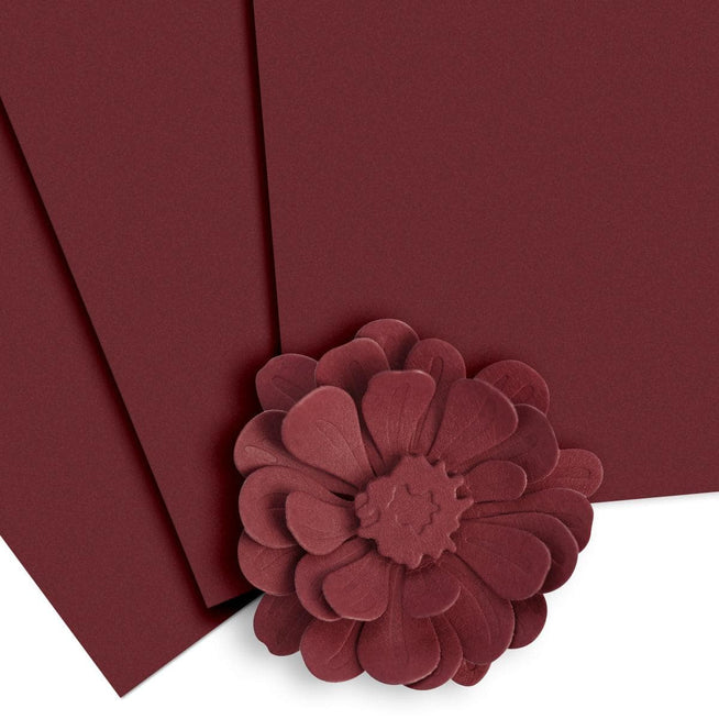 Altenew Crafty Necessities Cardstock Bundle featuring assorted colorful cardstock sheets for crafting and scrapbooking projects.