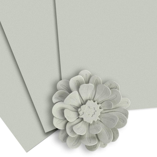 Altenew Crafty Necessities cardstock bundle with assorted colorful paper sheets for crafting and card making projects.