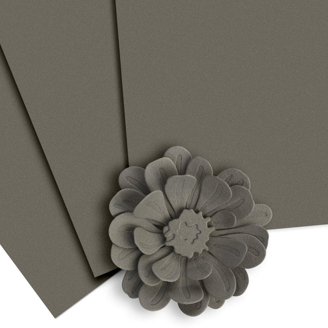 Altenew Crafty Necessities cardstock bundle featuring assorted colorful sheets for crafting and card-making projects.