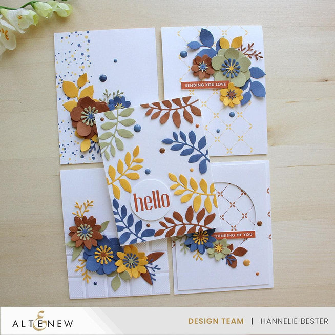 Altenew Crafty Necessities Cardstock Bundle with colorful sheets in various shades for crafting and scrapbooking projects.