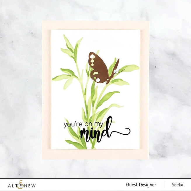 Altenew Spark Joy Fluttering Butterflies stamp set featuring detailed butterfly illustrations for crafting projects.