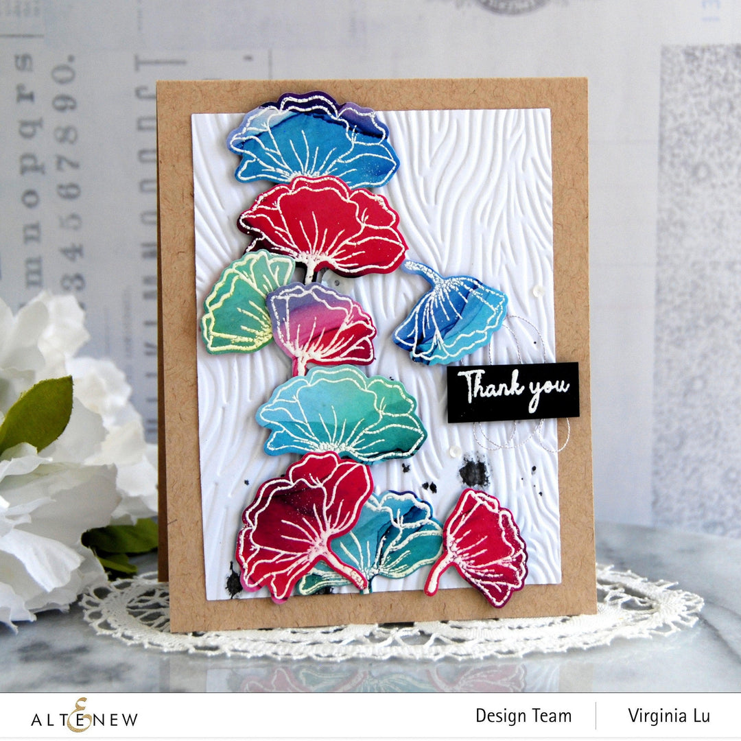 Altenew Gardens Around the World Mini Stamp Bundle featuring various garden-themed rubber stamps on a white background.