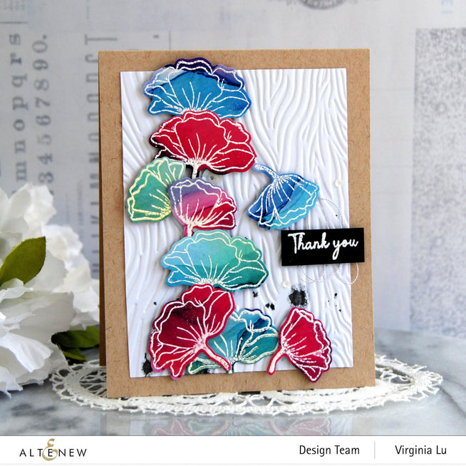 Altenew Gardens Around the World Mini Stamp Bundle featuring various garden-themed rubber stamps on a white background.