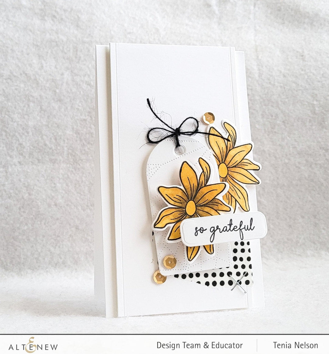 Altenew Gardens Around the World Mini Stamp Bundle with various garden-themed rubber stamps on clear sheets.
