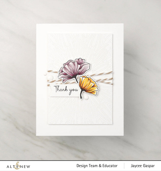 Altenew Gardens Around the World Mini Stamp Bundle featuring assorted garden-themed rubber stamps on clear sheets.