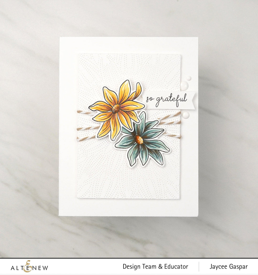 Altenew Gardens Around the World Mini Stamp Bundle with diverse floral and garden-themed rubber stamps for crafting projects.