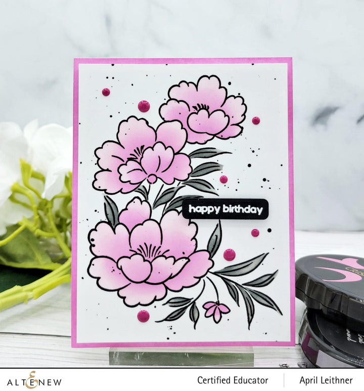 Altenew Happy Blossoms Ensemble stamp and die bundle featuring floral designs and intricate cutting dies for card making.