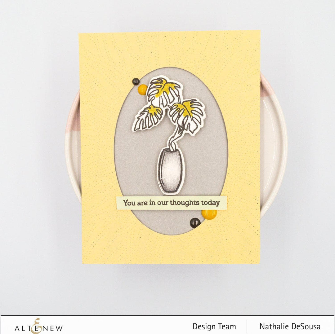 Altenew Monstera in Vase stamp and die bundle featuring detailed botanical designs for crafting and card making.