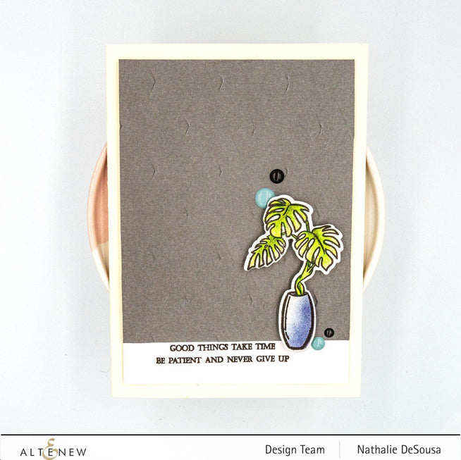 Altenew Monstera plant stamp and die bundle in a vase, perfect for crafting and DIY botanical projects.