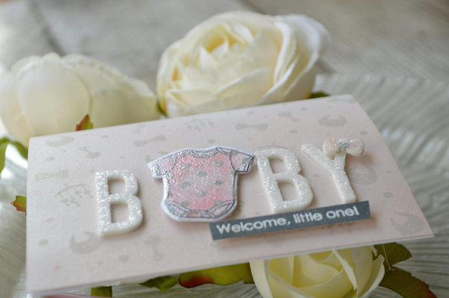 Altenew Little One Stamp & Die Bundle featuring cute baby-themed stamps and matching metal dies for crafting projects.