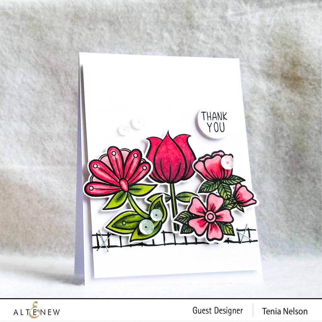 Altenew Whimsical Flower Arrangement Stamp & Die Bundle with colorful floral designs and intricate cutting details.