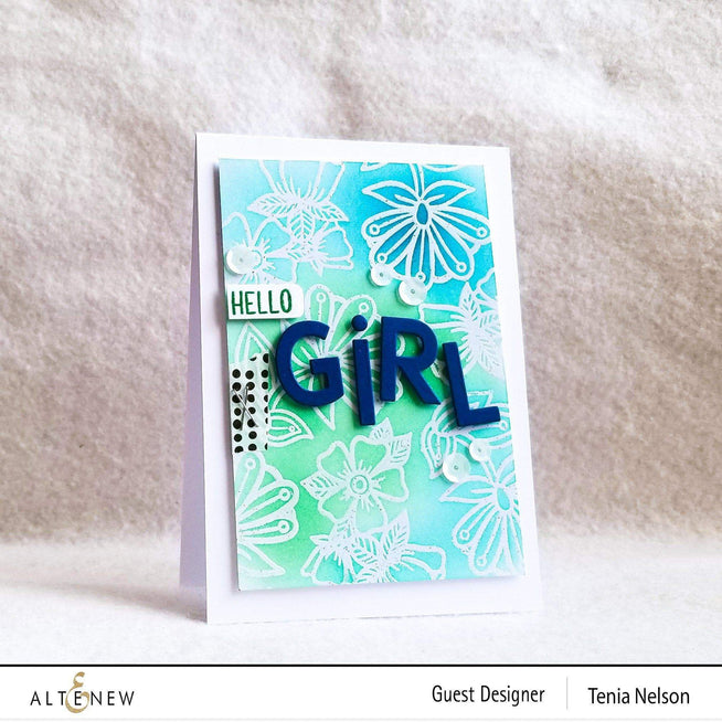Altenew Whimsical Flower Arrangement Stamp & Die Bundle with floral stamps and matching die cuts on a craft background.
