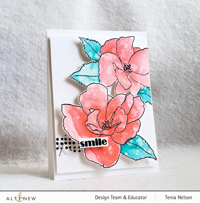 Altenew Paint-A-Flower China Rose and Hawaiian Shores stamp and watercolor pen bundle with brushes and fine tip pens for crafting.