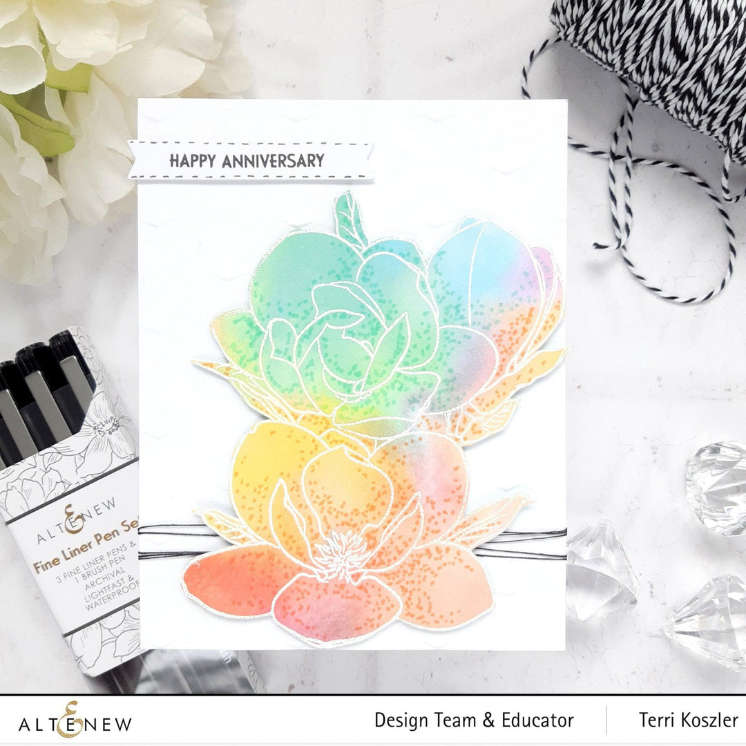 Altenew Paint-A-Flower Magnolia Rustica Rubra and Hawaiian Shores watercolor and brush pens bundle with stamps and fine-tip pens.