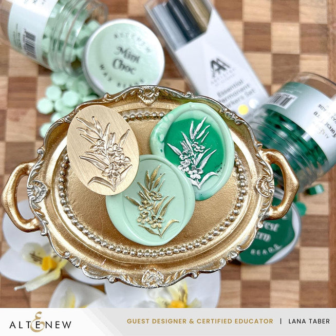 Set of Altenew Essential Permanent Markers featuring vibrant ink colors and fine tips, arranged on a white background.