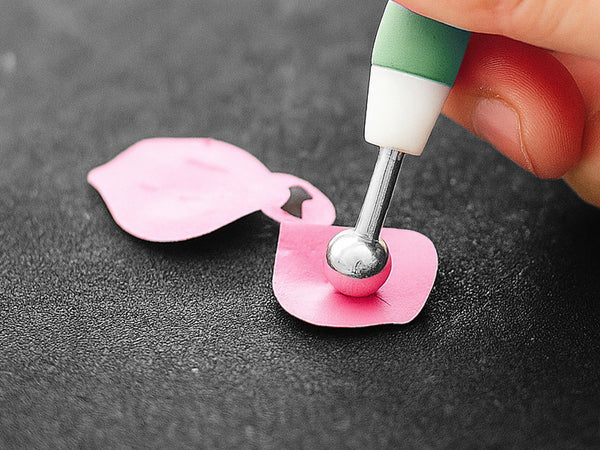 Place your die-cut pieces on the molding pad