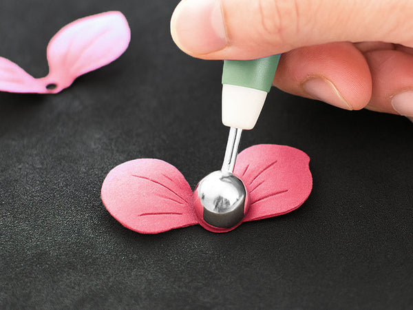 Use the Petal Shaper Tool on your die-cuts and press in a tight, circular motion