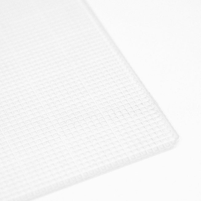 Altenew Original Sticky Mat 9x12 inches with grid surface for precise crafting and paper projects.