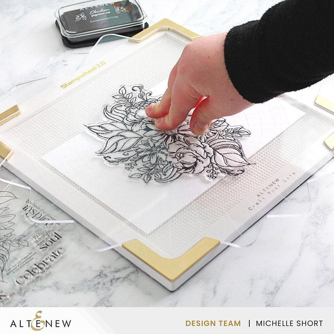 Altenew Next-Level Stamping Starter Bundle with various stamping tools and accessories for crafting and card making.