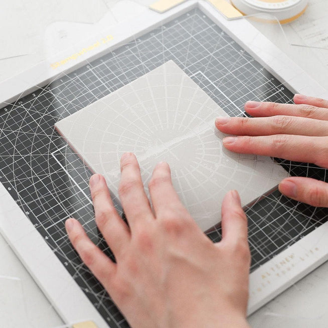 Altenew Next-Level Stamping Starter Bundle with various stamping tools and accessories for crafting and card-making projects.