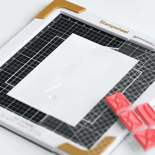 Altenew Next-Level Stamping Starter Bundle with various stamping tools and accessories for crafting and stamping projects