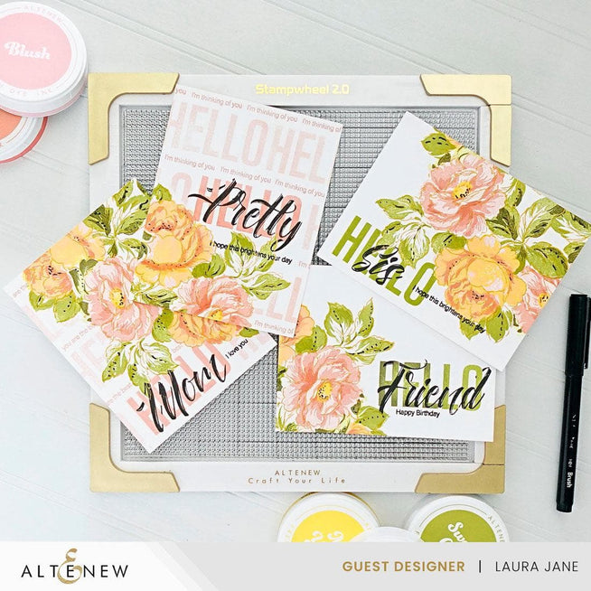 Altenew Stampwheel 2.0 tool for stamping projects, featuring a circular wheel with adjustable stamps and ergonomic handle.