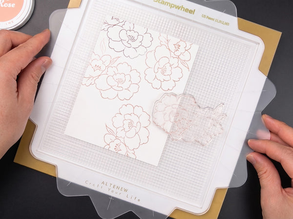 Apply ink to your stamp, flip it back down onto the cardstock, and stamp away!